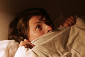 Persona a letto terrorizzata