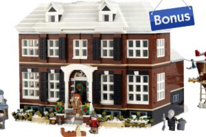 casa giocattolo con uomini lego e scritta bonus