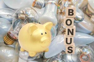 Lampadine e salvadanaio dorato