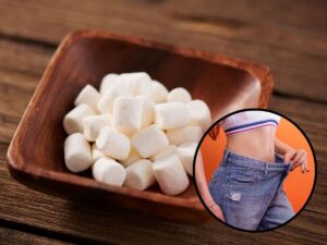 sfondo marshmallow e tondo ragazza con pancia magra